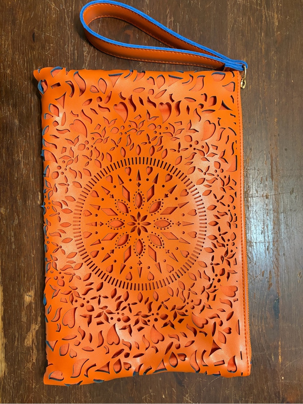 Carlos by Carlos Santana Orange Laser-Cut Wristlet Clutch with Blue Trim